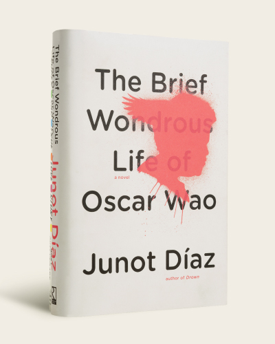 White book cover with red spray-painted silhouette of man