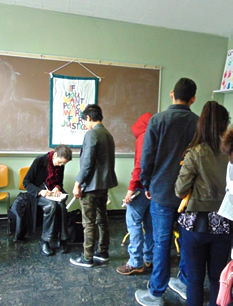 Participants waiting in line to have their book signed by Julia Alvarez.
