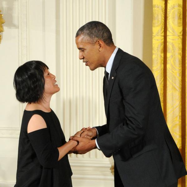 Billie Tsien receiving an award from Barack Obama