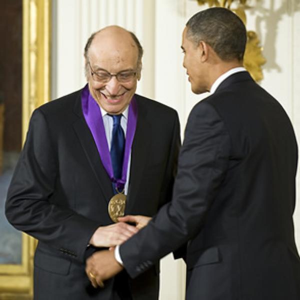 2009 National Medal of Arts recipient and graphic designer Milton Glaser receives his medal from President Barack Obama