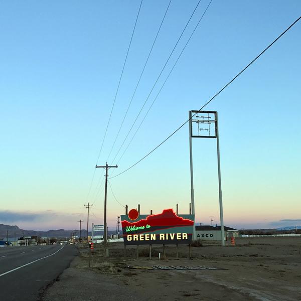 A neon sign outside the town of Green River, Utah.