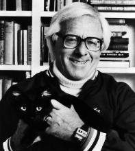 author Ray Bradbury posing with a cat