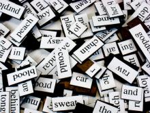 a pile of magnetic poetry fridge tiles